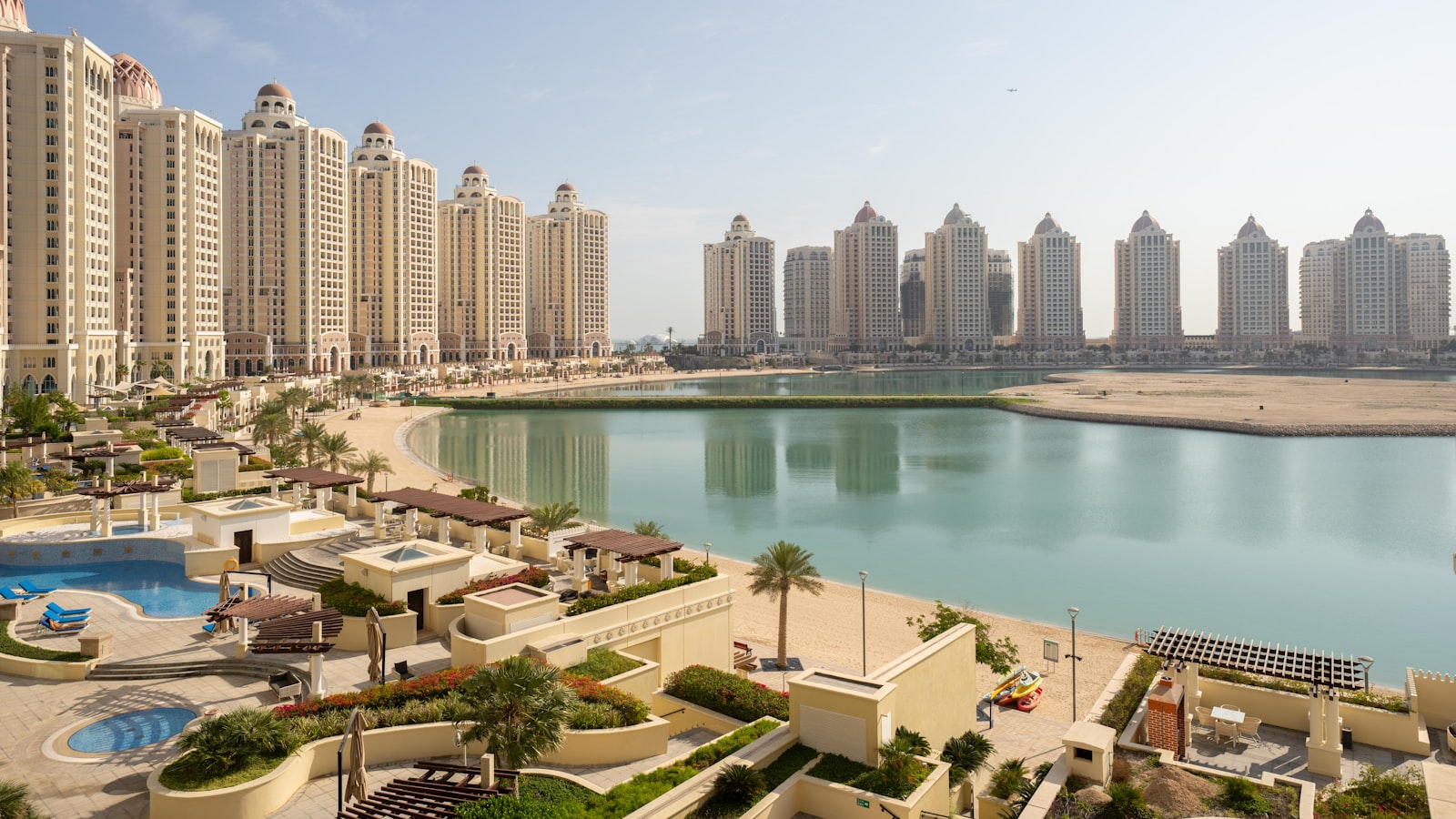 A large body of water surrounded by tall buildings
