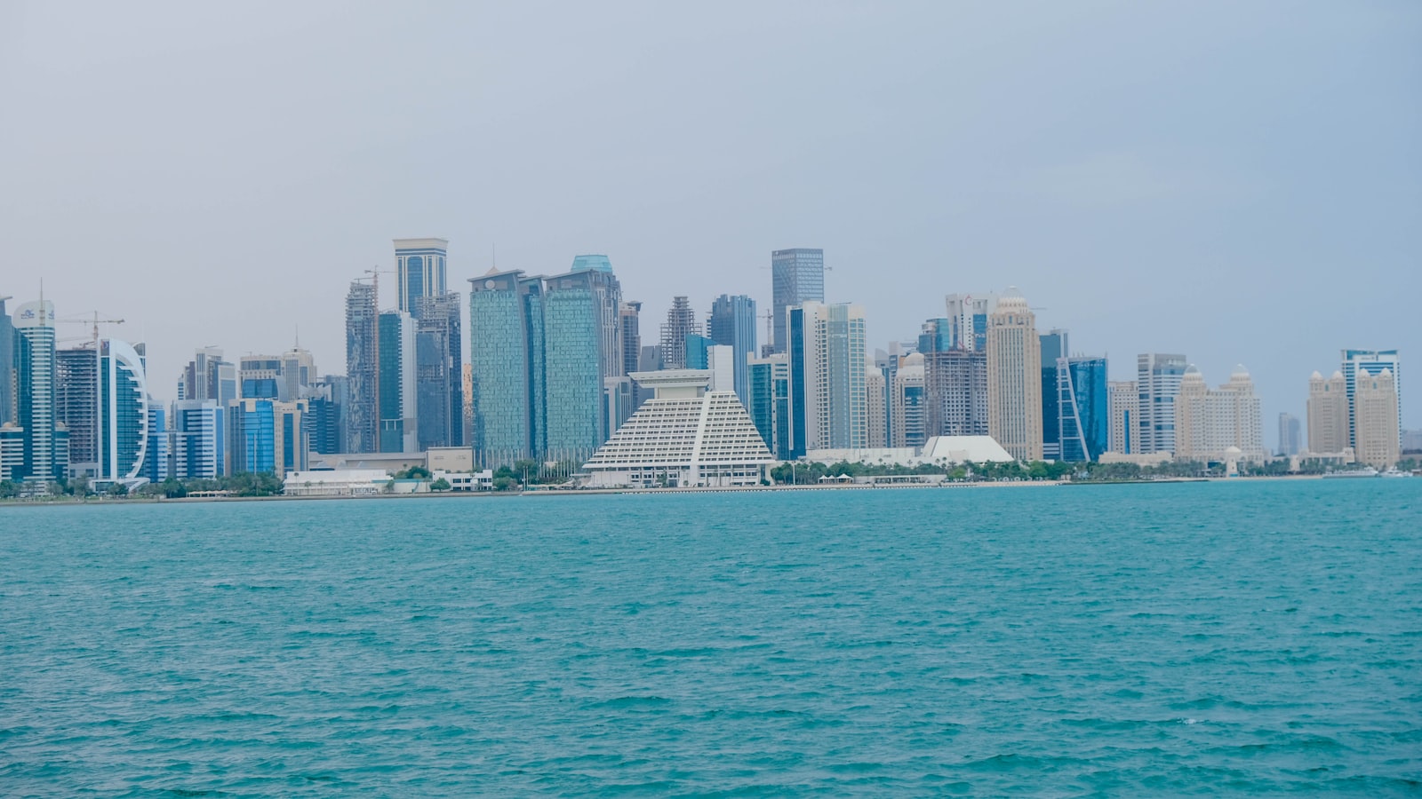 a view of a city from the ocean