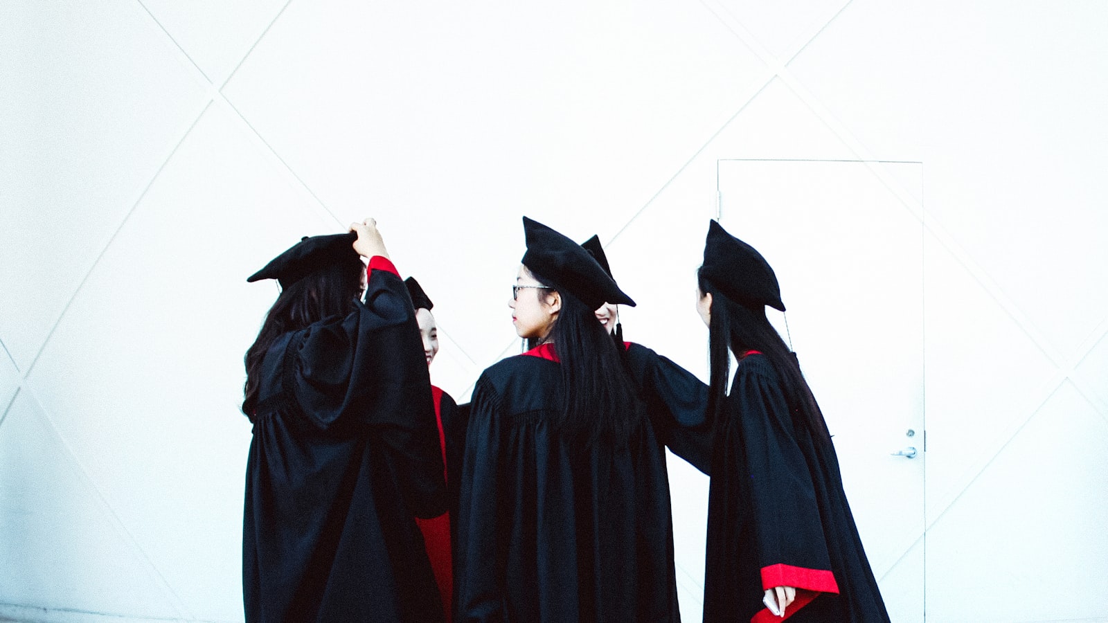people in academic dress standing