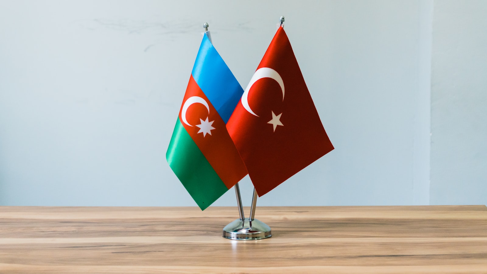 Azerbaijan and turkey flags on a table