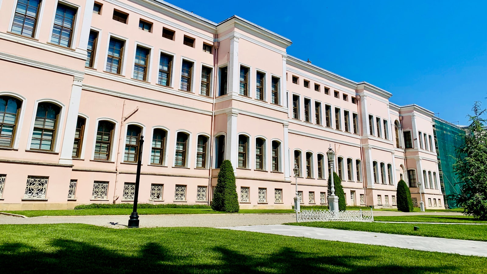 beige concrete building under blue sky during daytime