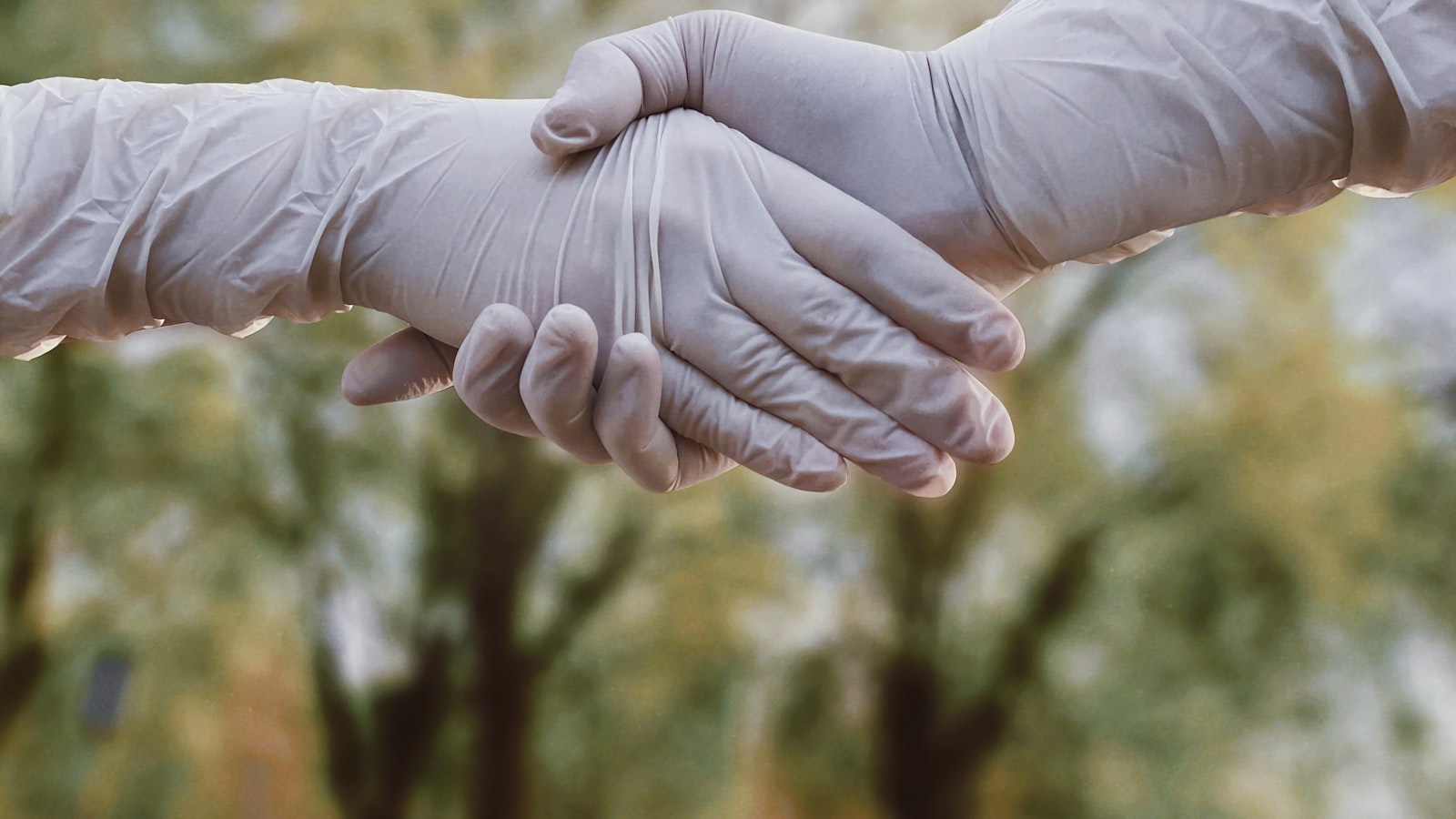 person holding babys hand