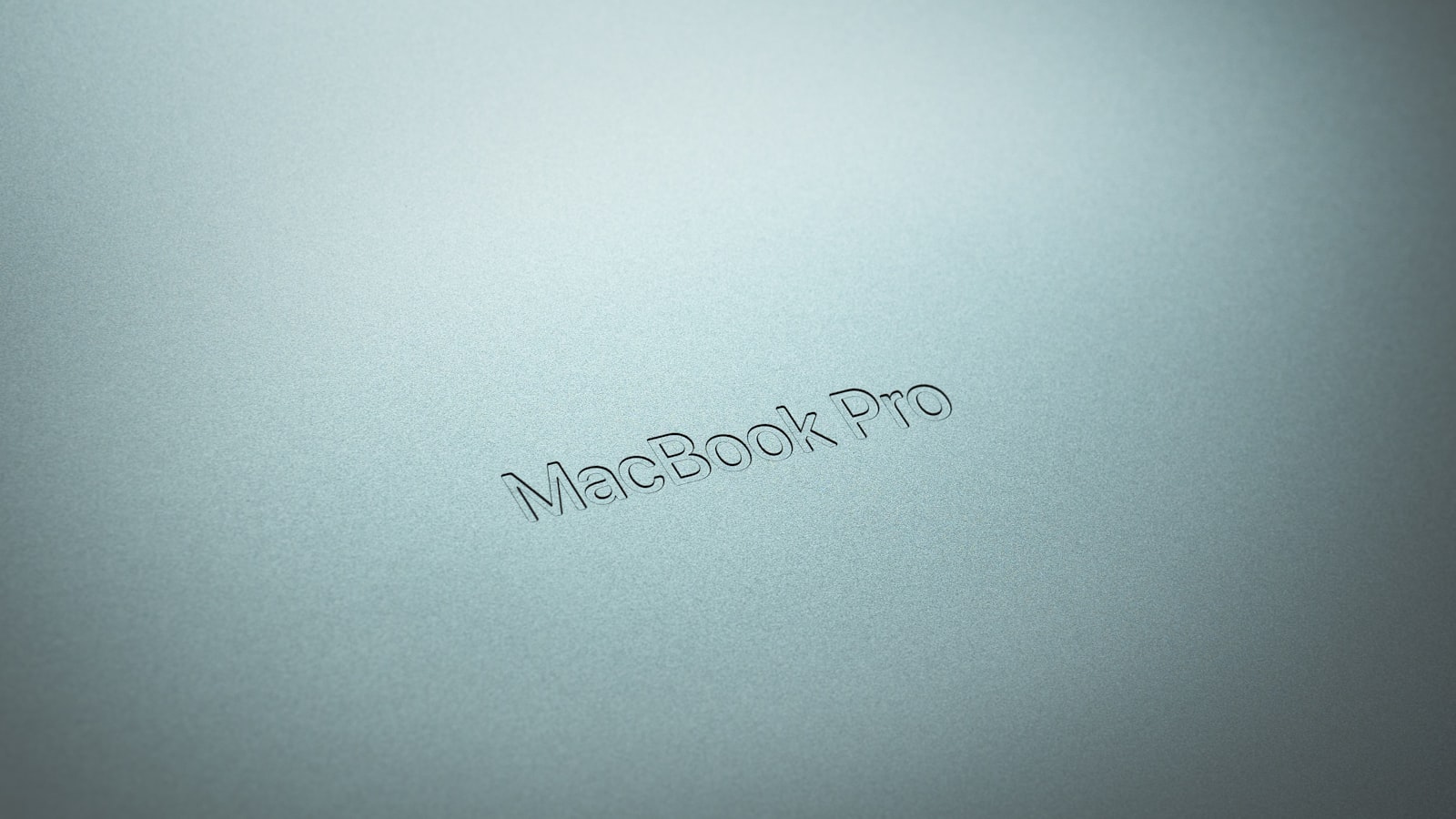 a close up of a macbook pro logo