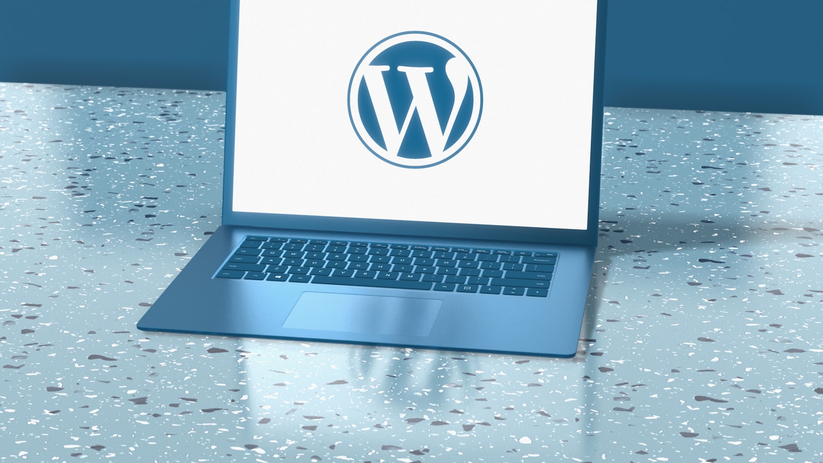 a laptop computer sitting on top of a table