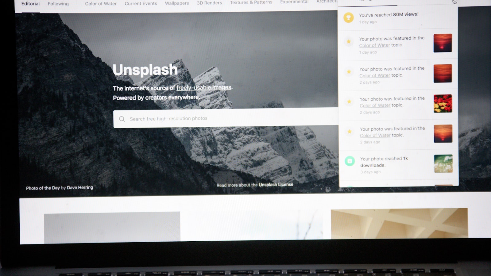 an open laptop computer sitting on top of a desk