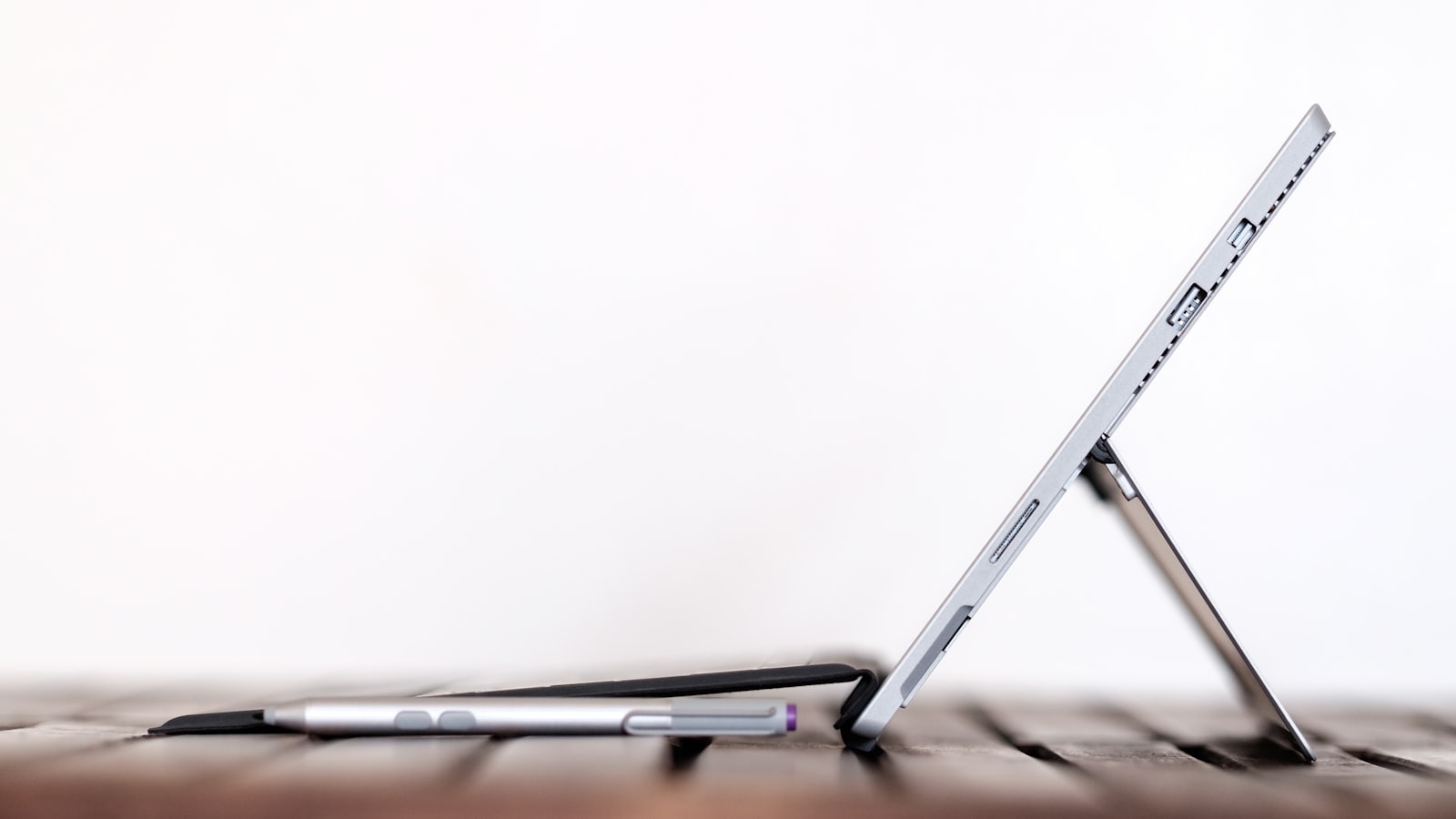 stylus pen in front of table computer