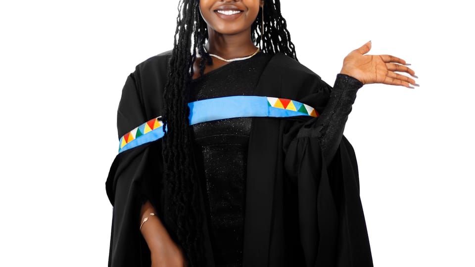 a person wearing a graduation cap and gown