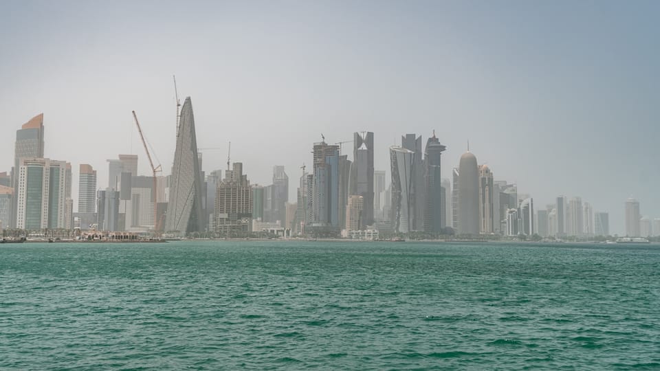 a city skyline across the water