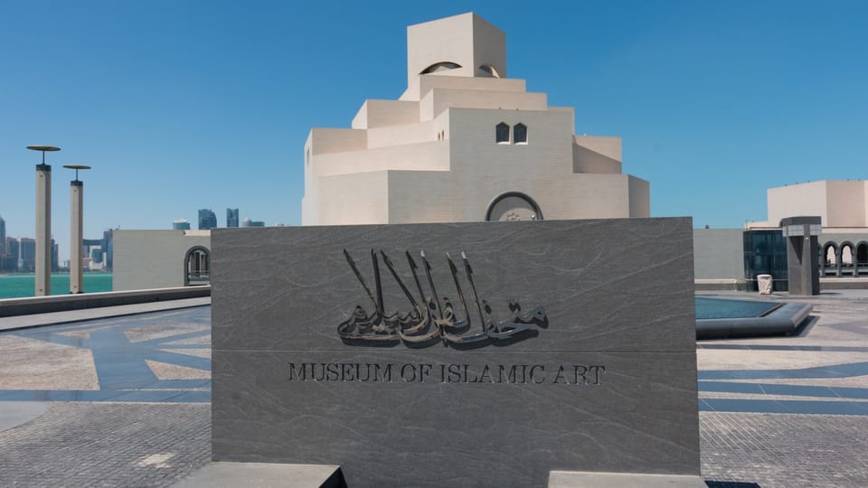 gray concrete building under blue sky during daytime