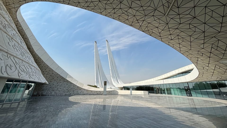 a view of a building with a sky background