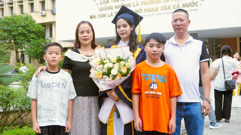 a group of people standing next to each other
