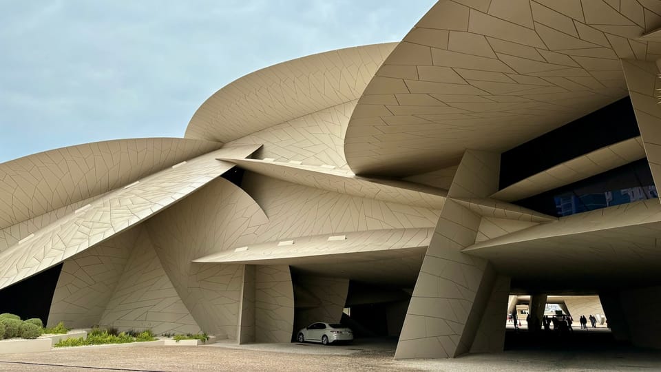 a car is parked in front of a building