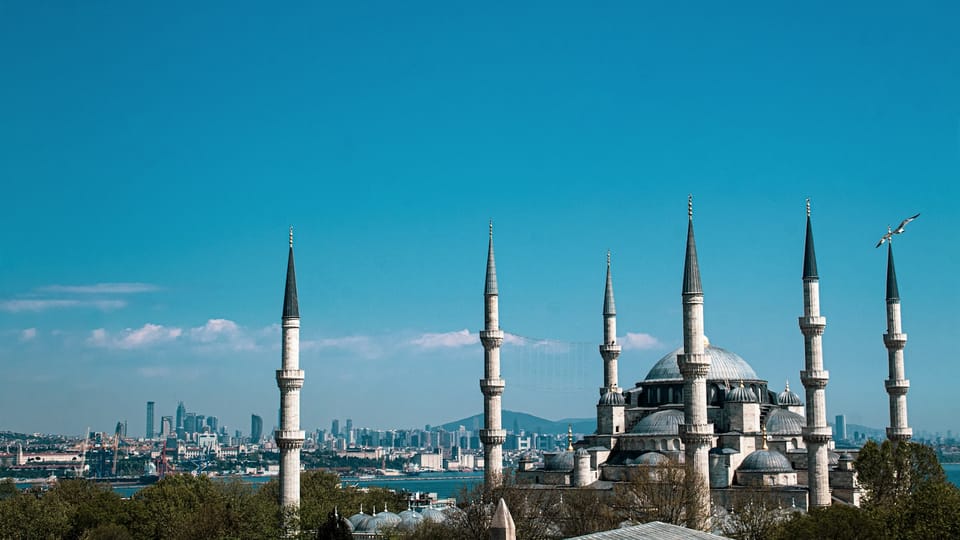 a view of a large building with many spires