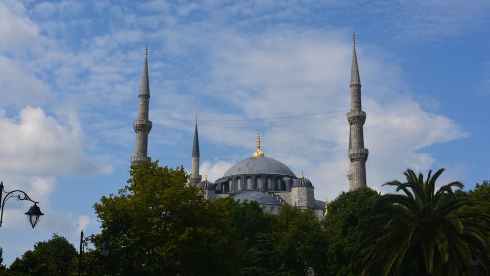 a view of a large building with many spires