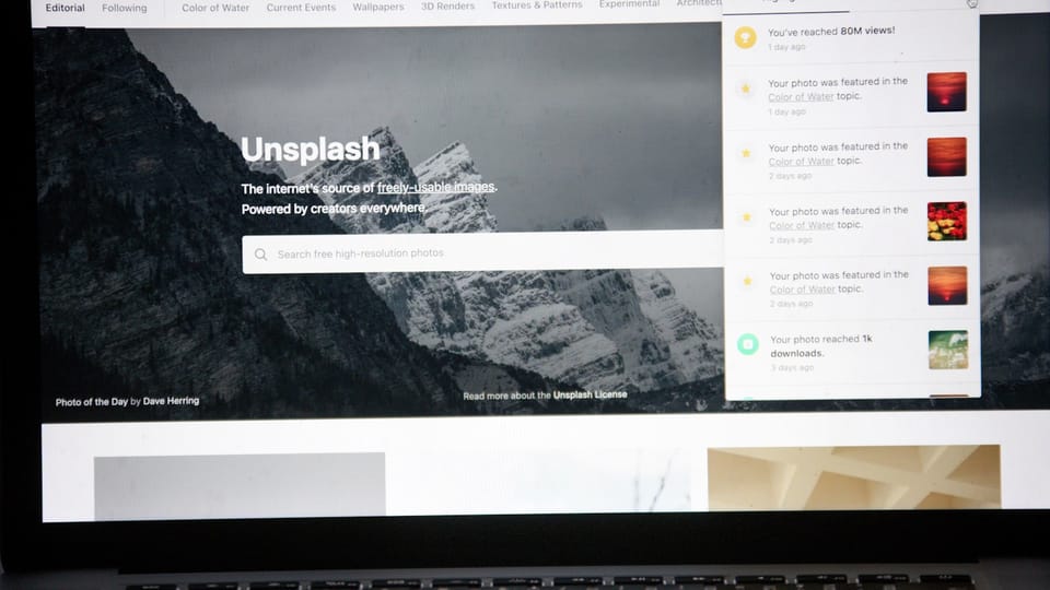 an open laptop computer sitting on top of a desk