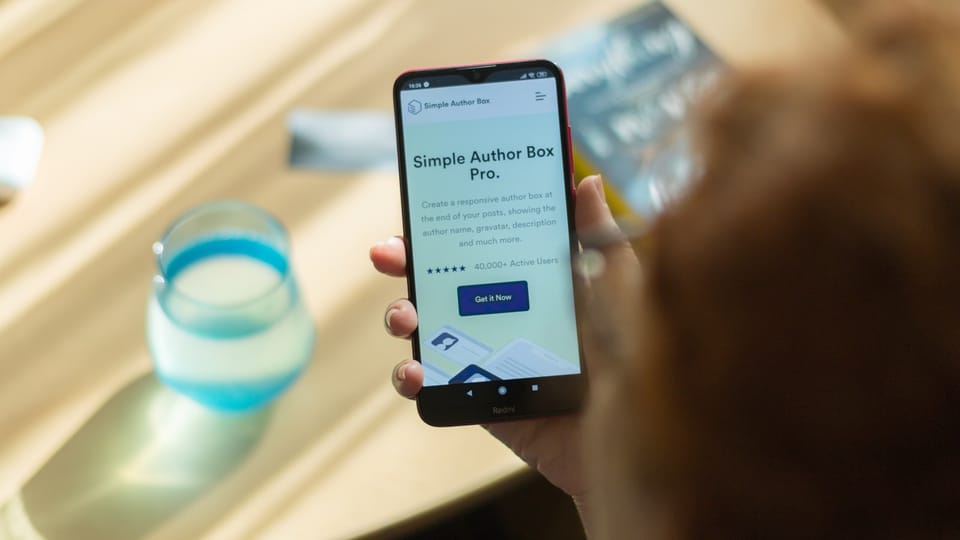 person holding black android smartphone