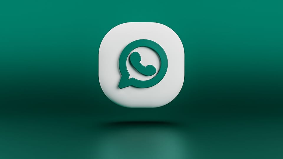 a green and white whatsapp icon on a green background